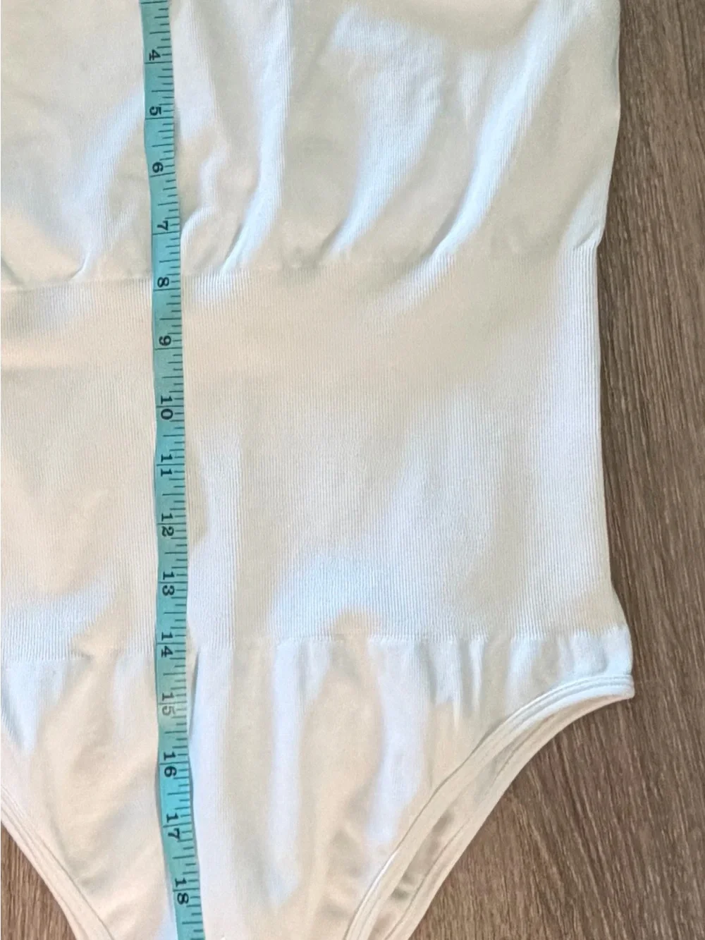 Women’s White Sleeveless One-Piece Bodysuit